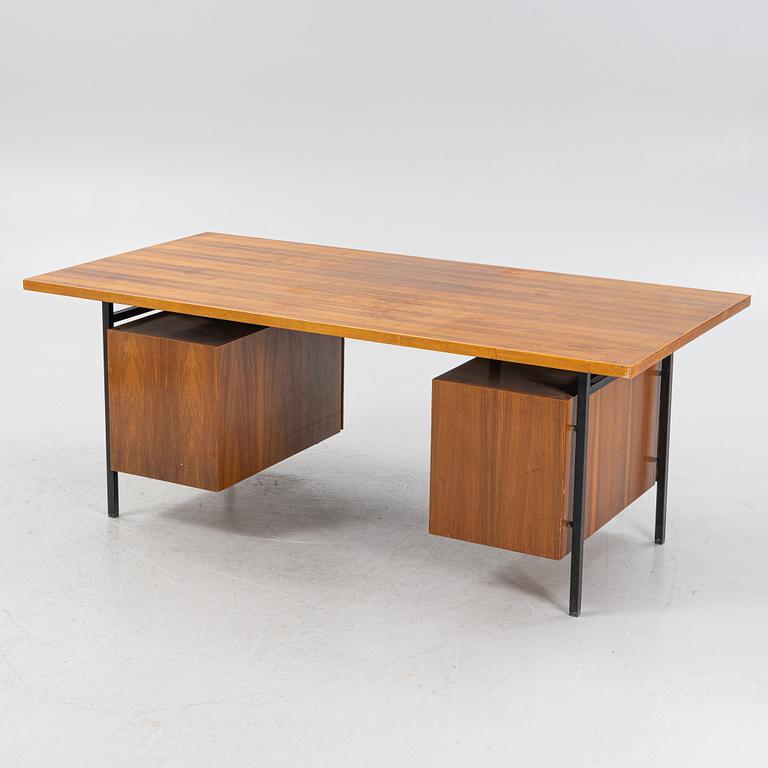 Florence Knoll, a model 590-036 walnut-veneered desk, by Nordiska Kompaniet in Sweden for Knoll International, 1962.
