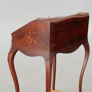 A Louis XV-style writers desk from the mid 20th century.