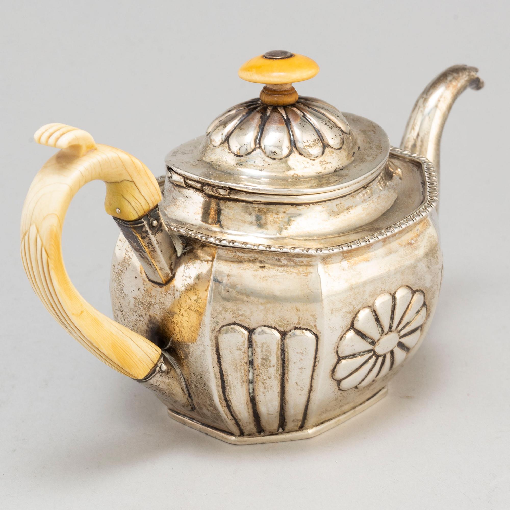 A Russian 19th century parcel-gilt silver tea-pot, St.Petersburg ...