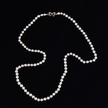 Cultured pearl necklace, clasp with old-cut diamonds.