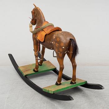 A first half of the 20th century wooden rocking horse.