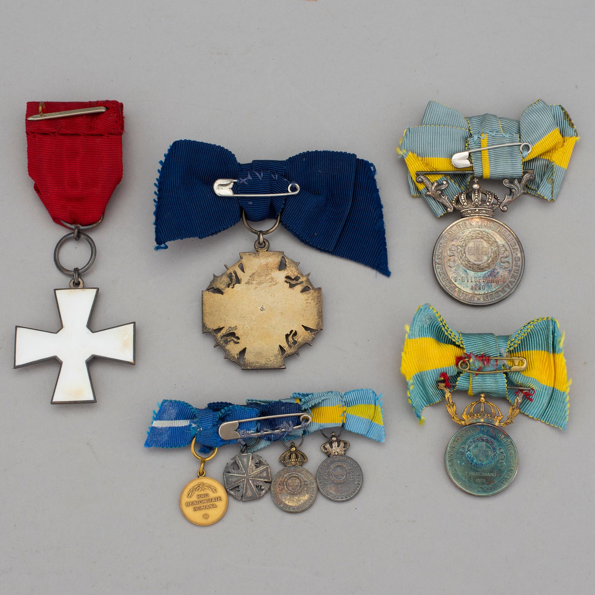 Five medals, two Orders of the Lion of Finland and one Order of the White Rose of Finland.