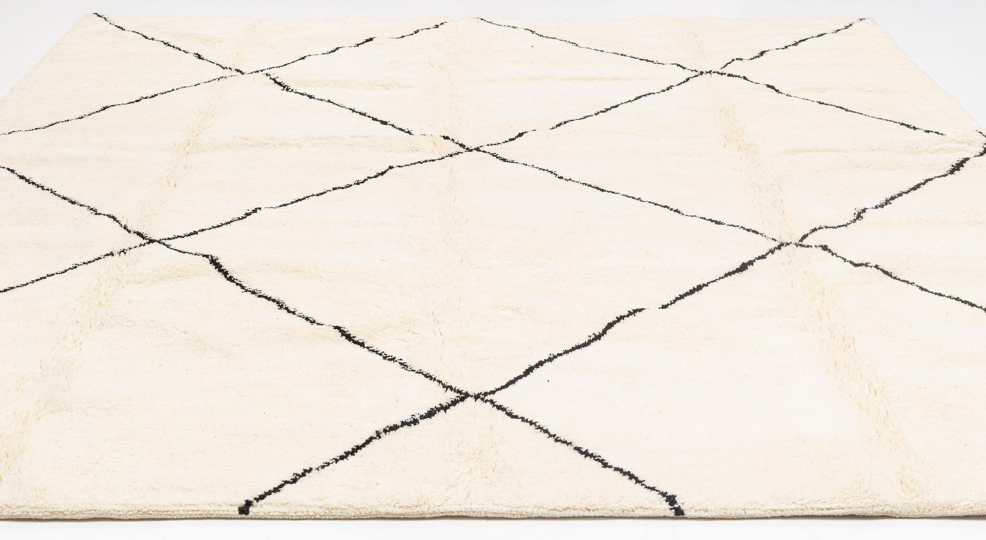 A Carpet, Morocco, circa 390 x 340 cm.