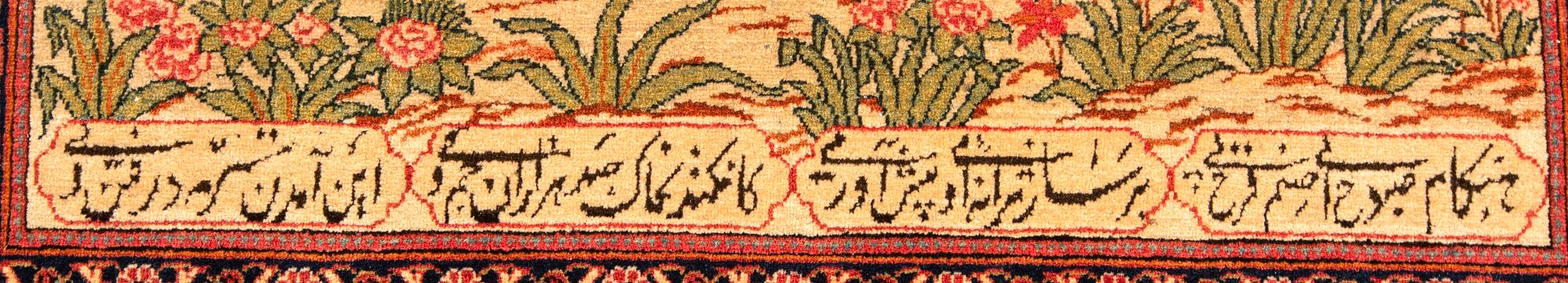 A semiantique signed Kashan carpet ca 203x135 cm.