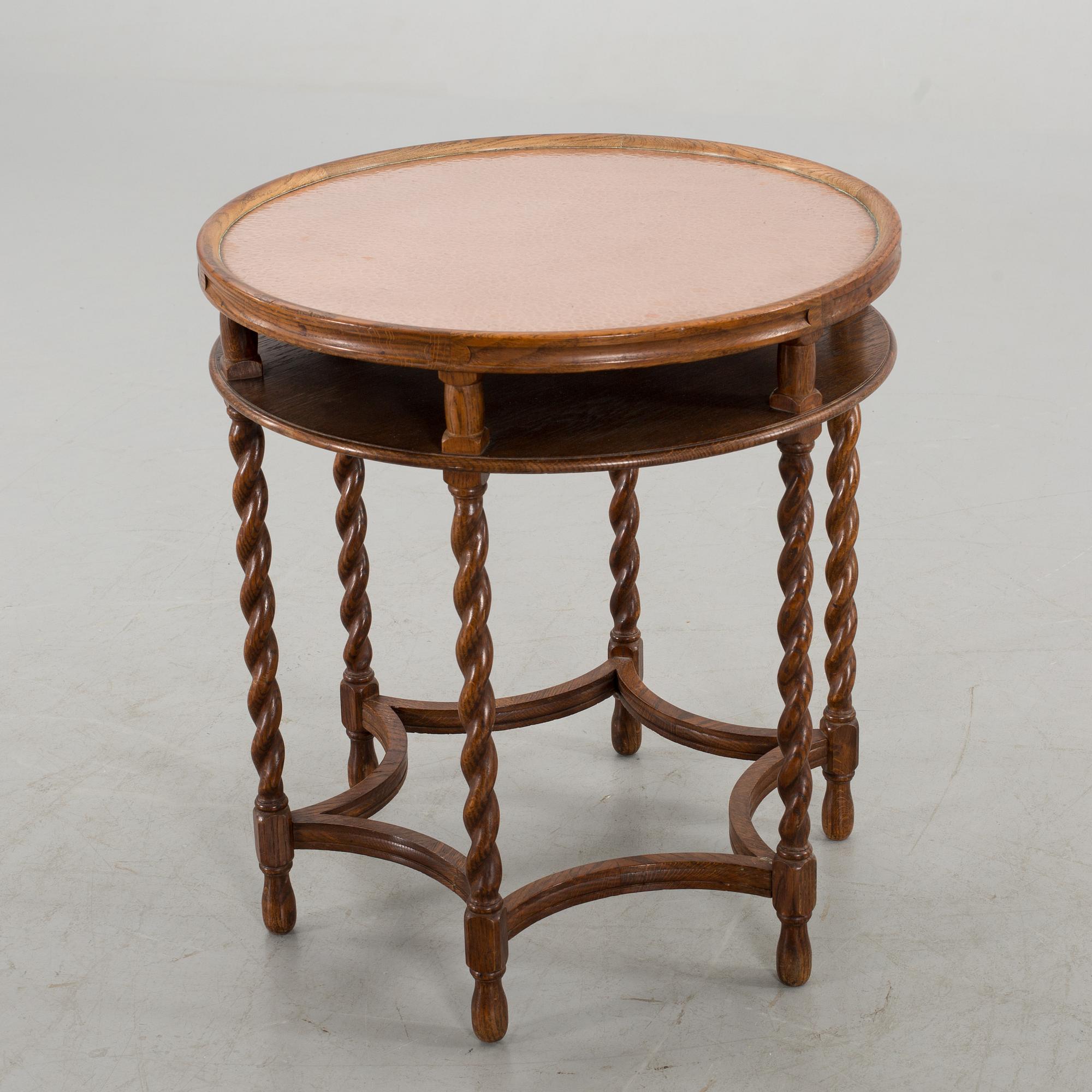 AN OAK TABLE FROM NORDISKA KOMPANIET, 1921.
