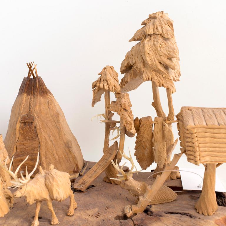 MARTIN STENSTRÖM, Jutsajaure, skulpturgrupp, snidat trä, signerad M.S. och daterad Jutsajaure 1987.