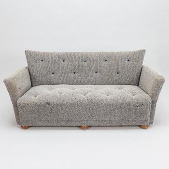 A mid-20th century sofa.