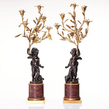 A pair of Louis XV/ Louis XVI five-light candelabra, second part of the 18th century.