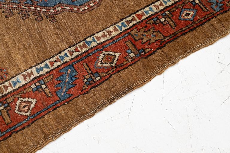 An antique Sarab rug, northwestern Iran, c. 213 x 107 cm.