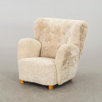 A DANISH SHEEPSKIN ARMCHAIR, 1940-50's.
