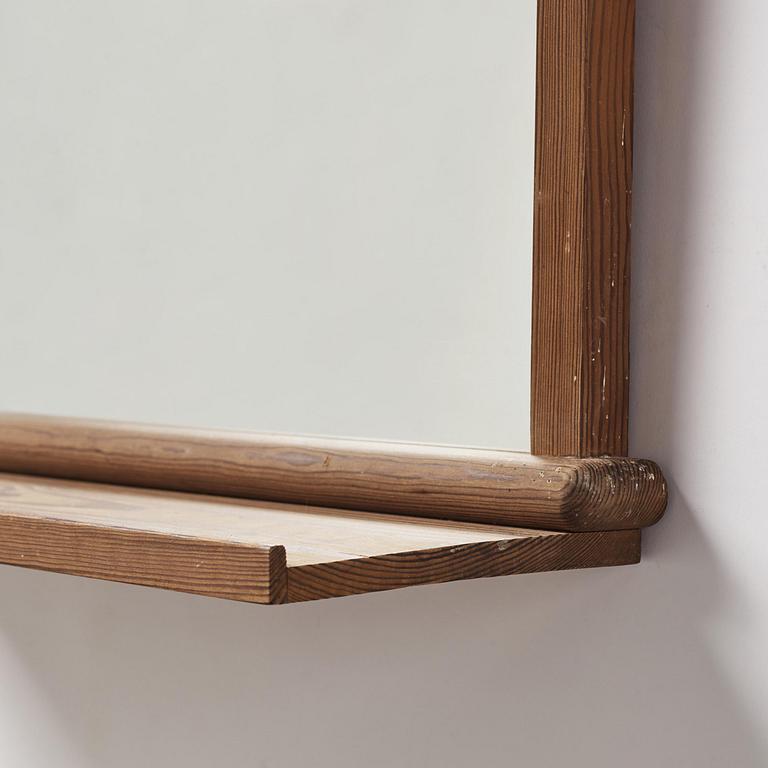 Axel Einar Hjorth, a stained pine "Sport" wall mirror with a shelf, Nordiska Kompaniet, Sweden, 1930s.