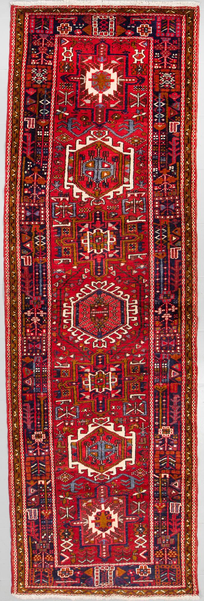 A Garadje runner, 335 x 102 cm.