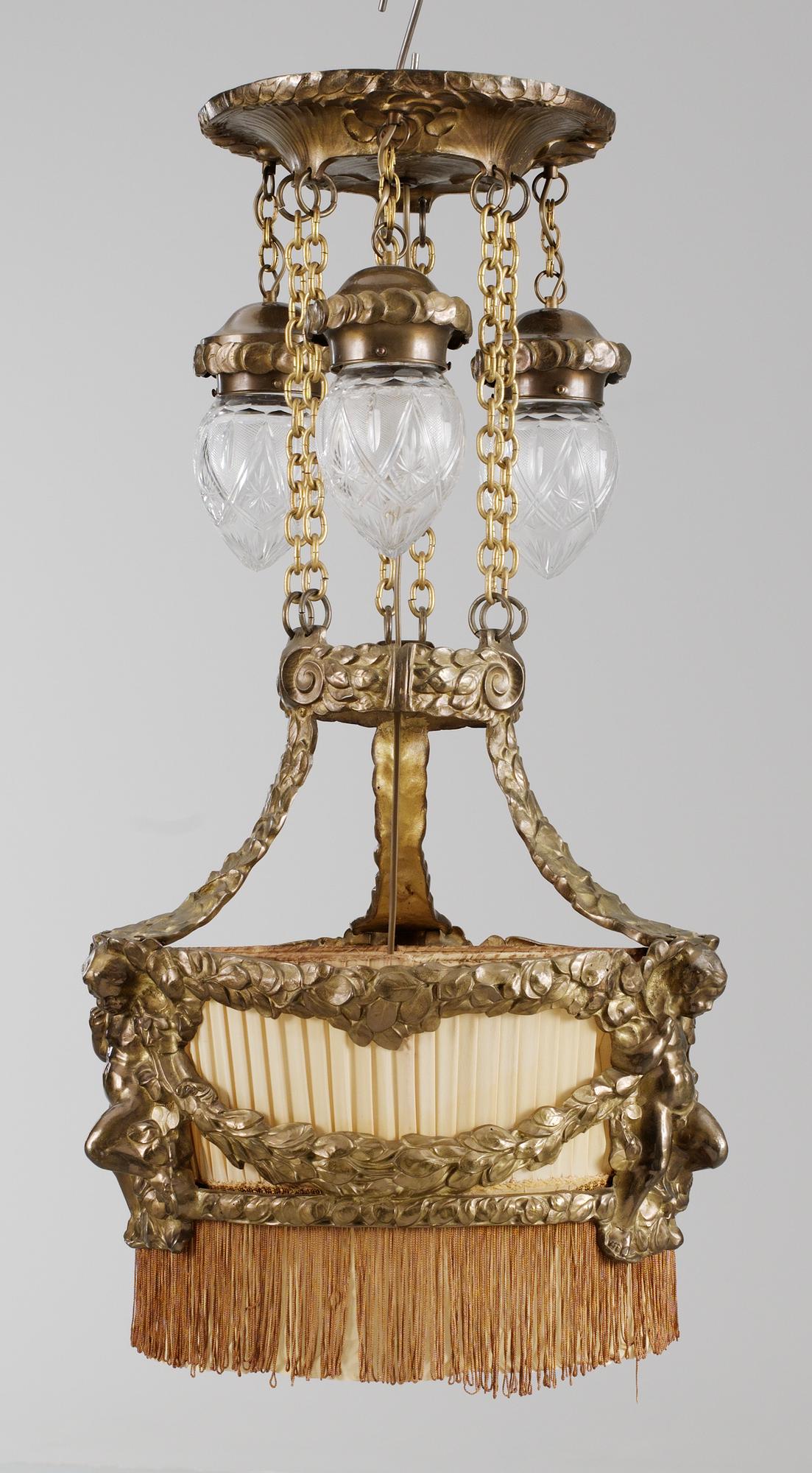 An Art Nouveau patinated brass hanging lamp, by Böhlmarks, Stockholm 1910's-20's.