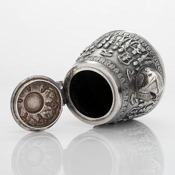 An Indian silver teapot.