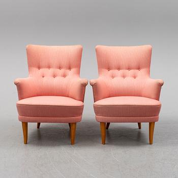 A pair of Carl Malmsten easy chairs.