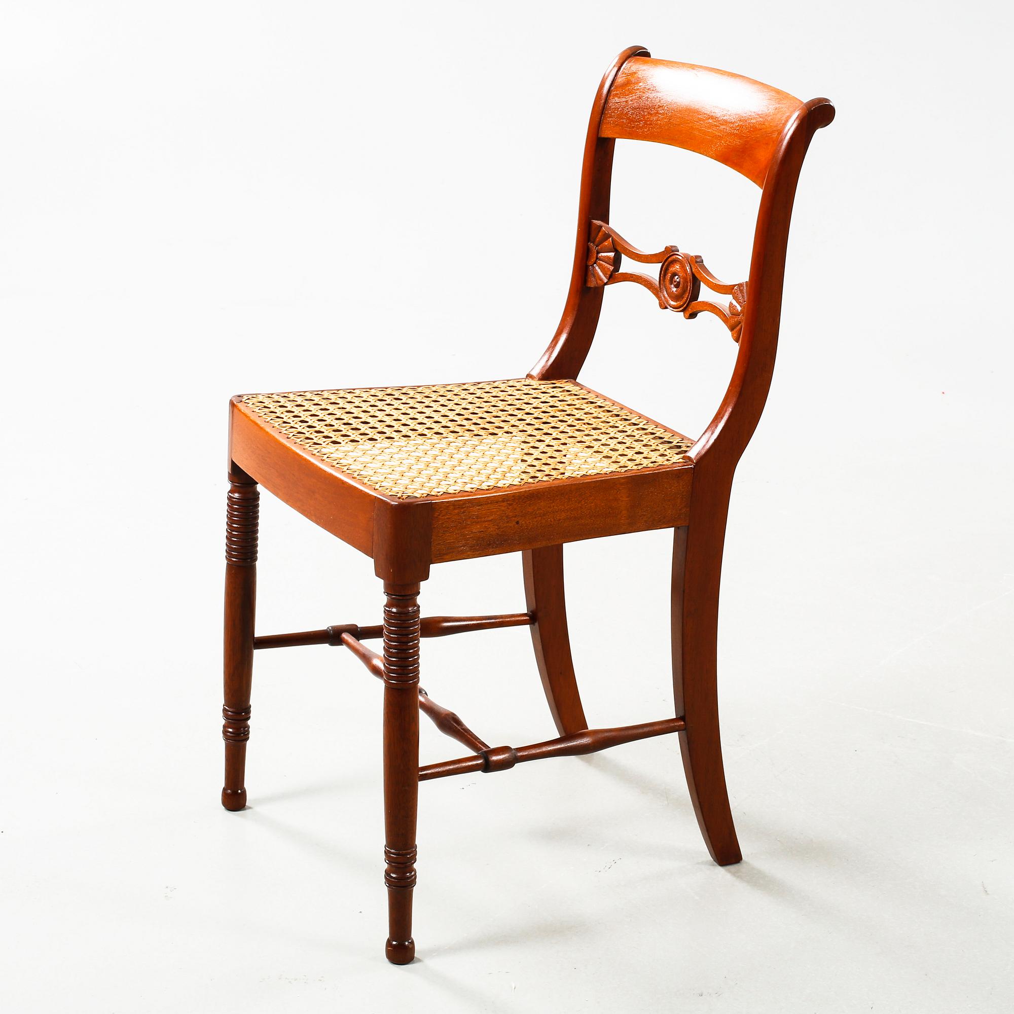 Nine chairs, made by Nils Tohrsson in Lindome (1779 - 1848) in the first half of the 19th century.