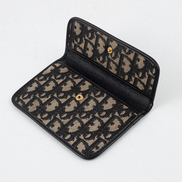 Christian Dior, handbag and wallet.