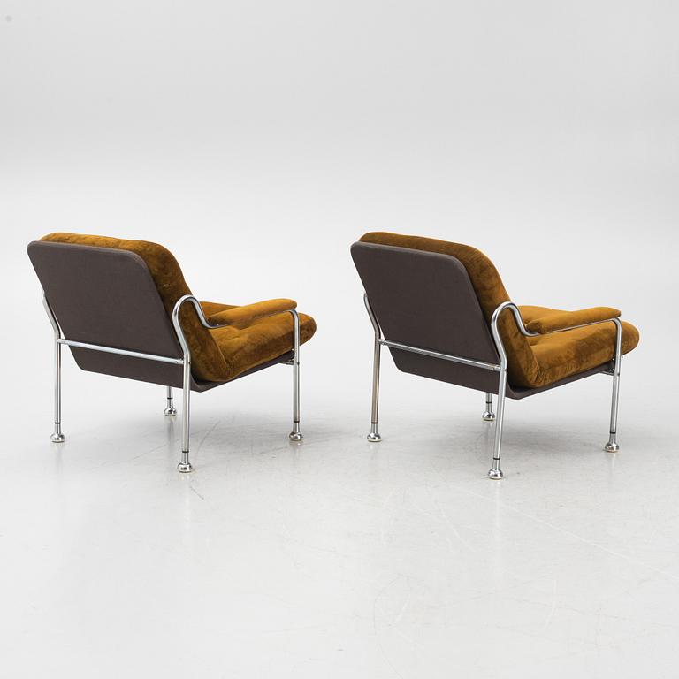 Bo Eigert, a pair of "Stålbo"  armchairs, Firma B. Eigert AB, Hova, Sweden, 1970's.