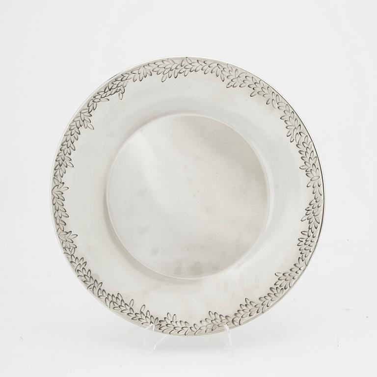 Signe Persson-Melin, a polished pewter plate "Myrten" for Firma Svenskt Tenn 2006.