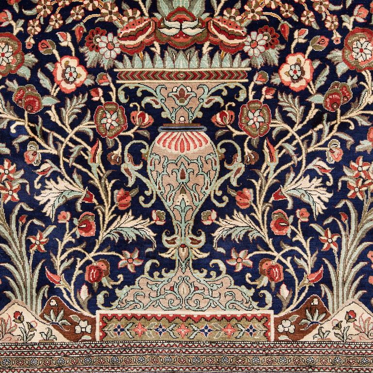 A SILK QUM RUG, ca 222 x 139 cm.