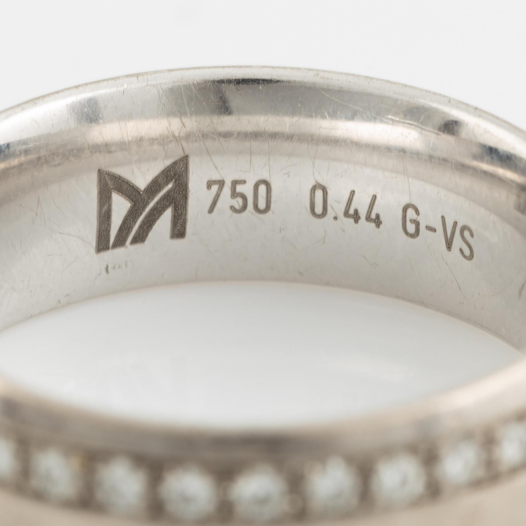 White gold and brilliant cut diamond ring.