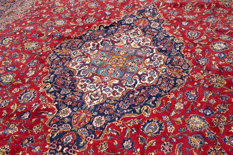 A Keshan carpet, c. 600 x 392 cm.