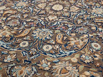 A RUG. A semi-antique silk Kashan Souf (in relief). 210 x 131,5 cm (as well as one cm flat weave at each end).