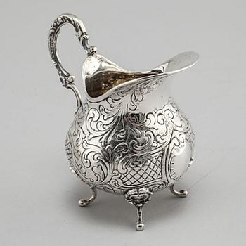 A silver sugarbowl, a cream jug and a tray by J L Hultman, Stockholm, mid 20th century.