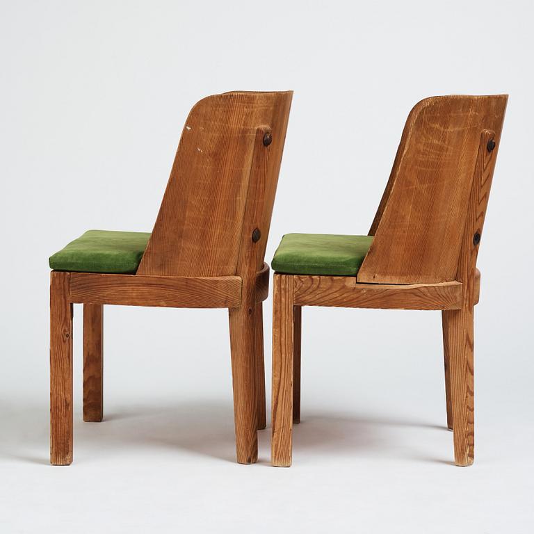 Axel Einar Hjorth, a pair of stained pine 'Lovö' chairs, Nordiska Kompaniet Sweden 1930s.