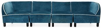 418. Otto Schulz, An Otto Schulz blue velvet sofa in four sections.