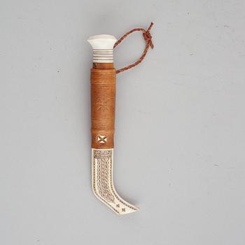 Per Erik Svonni, a Sami reindeer horn knife, signed P.E. Sv.