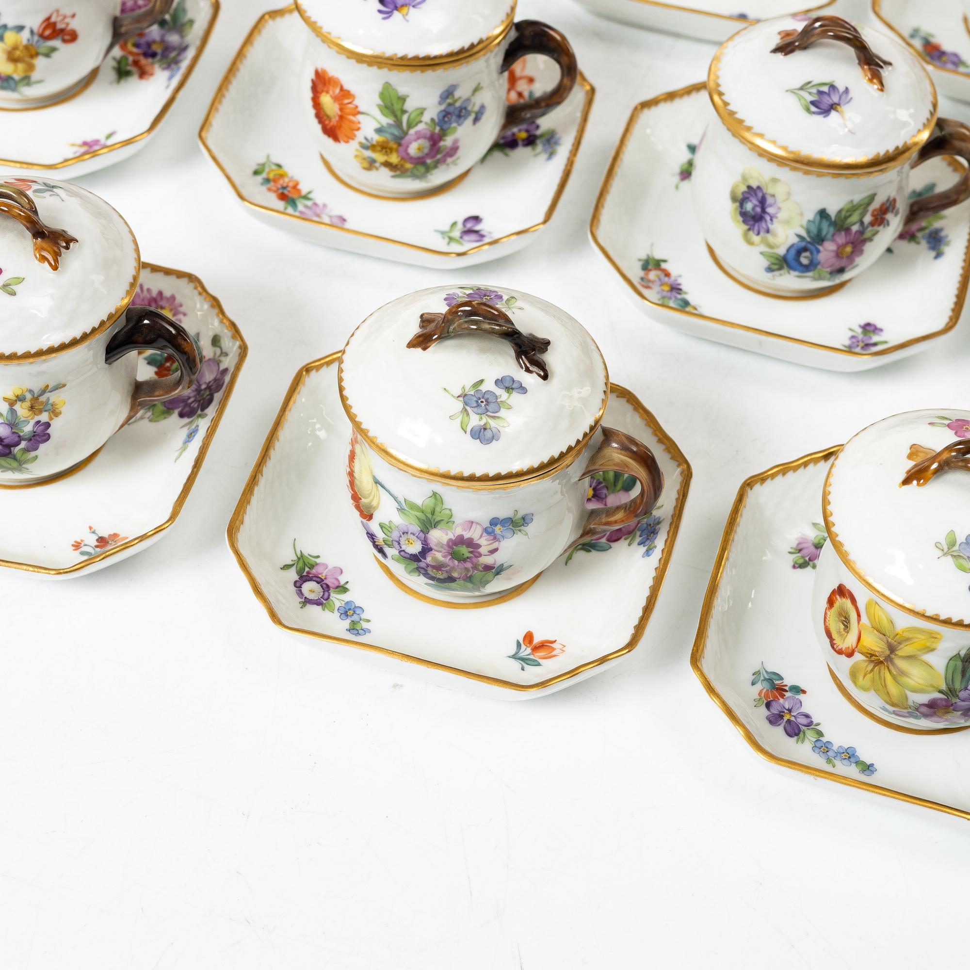Royal Copenhagen, twelve cream cups with saucers, 'Saxon Flower', Denmark, 1923-34.