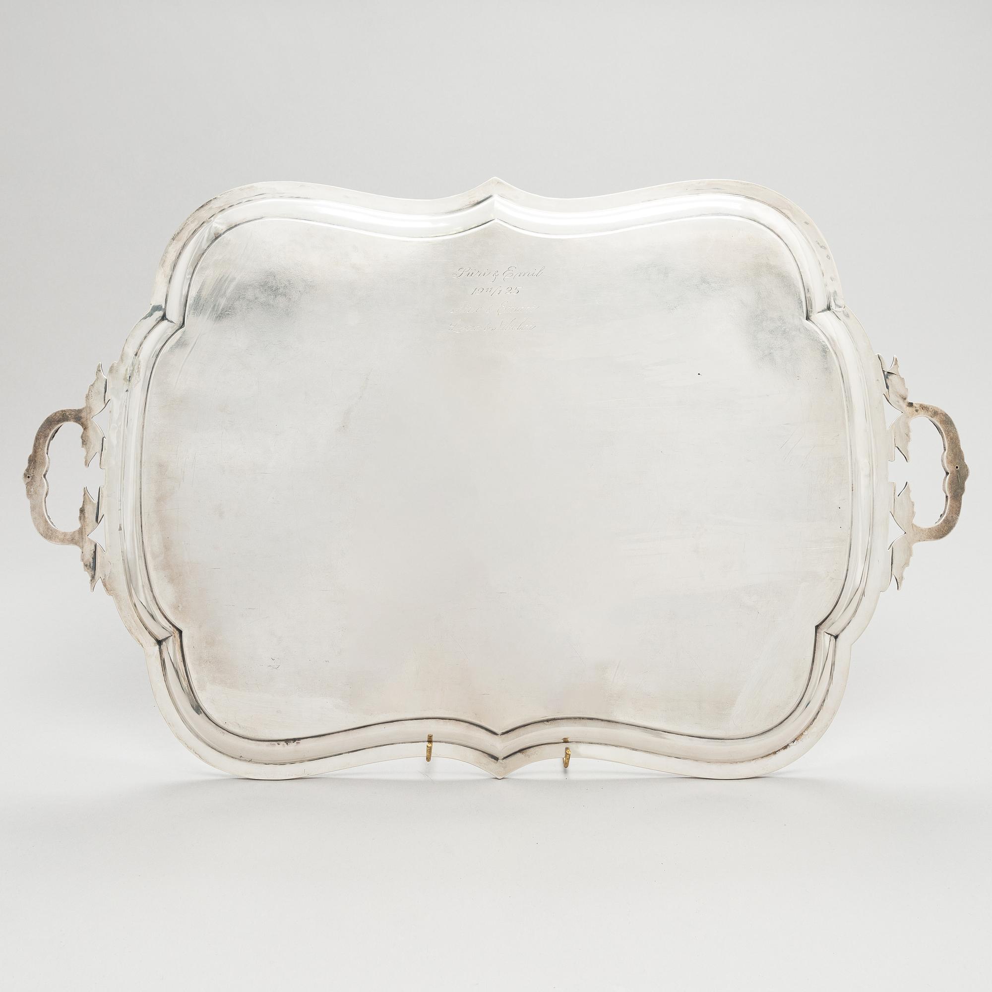 A Russian silver tray, Moscow, maker's mark IV. Unclear year mark, assay master mark Aleksandr Kudrin (1878-82).