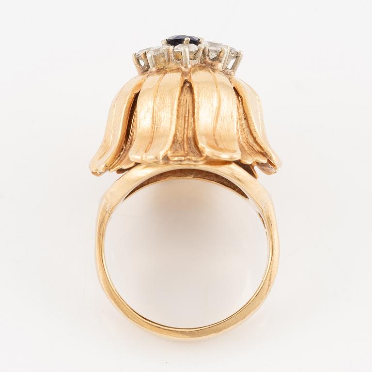Ring, Hans Scherlund, 18K gold with white and blue stones.