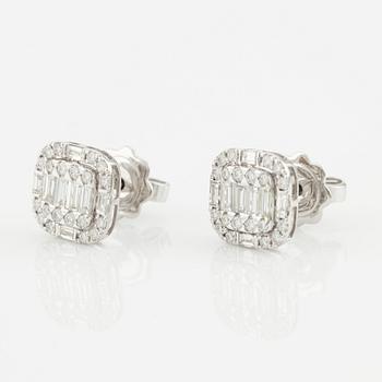 Earrings with baguette-cut and brilliant-cut diamonds.