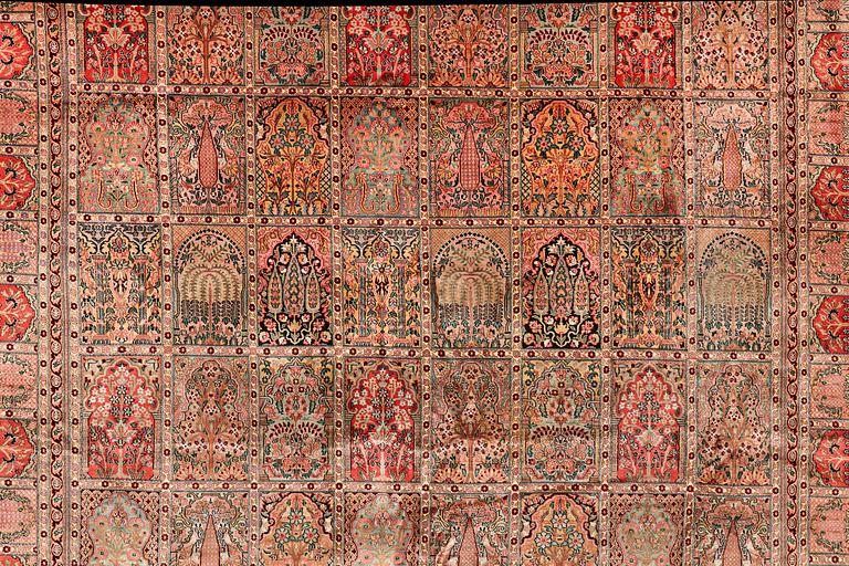 A carpet, silk Kashmir, ca 428 x 299 cm.