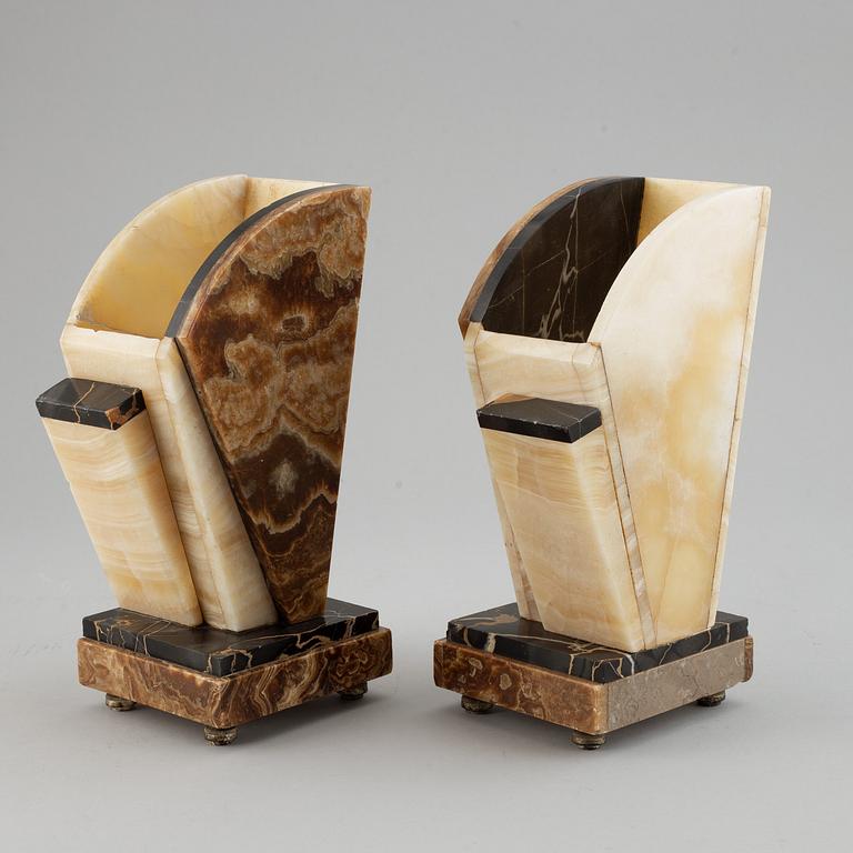 A three piece clock garniture, Art Deco style, 20th Century.