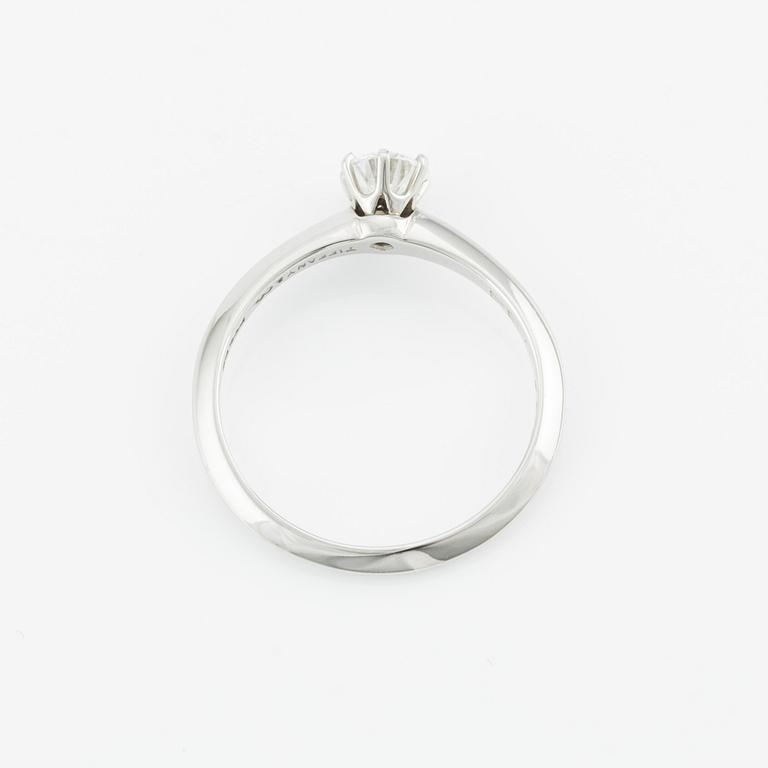 Tiffany & Co, platinum ring with a brilliant-cut diamond.