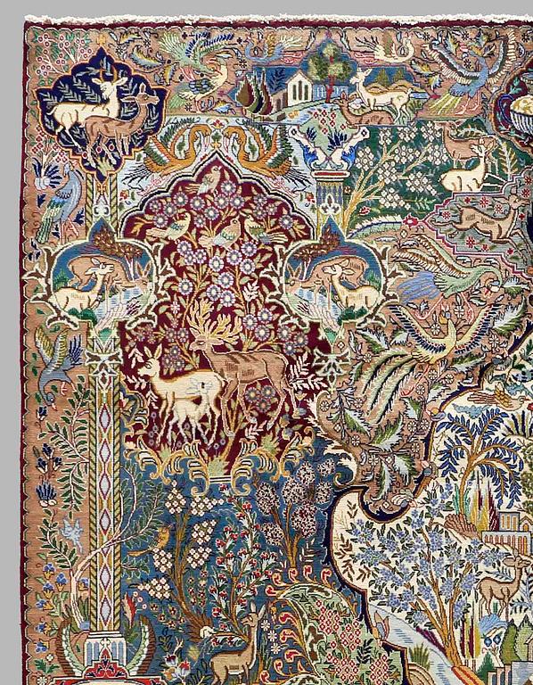 A Kashmar figural carpet. Circa 390 x 300 cm.