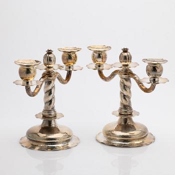 C.G. Hallberg, Pair of candelabra, silver, Stockholm, 1927.