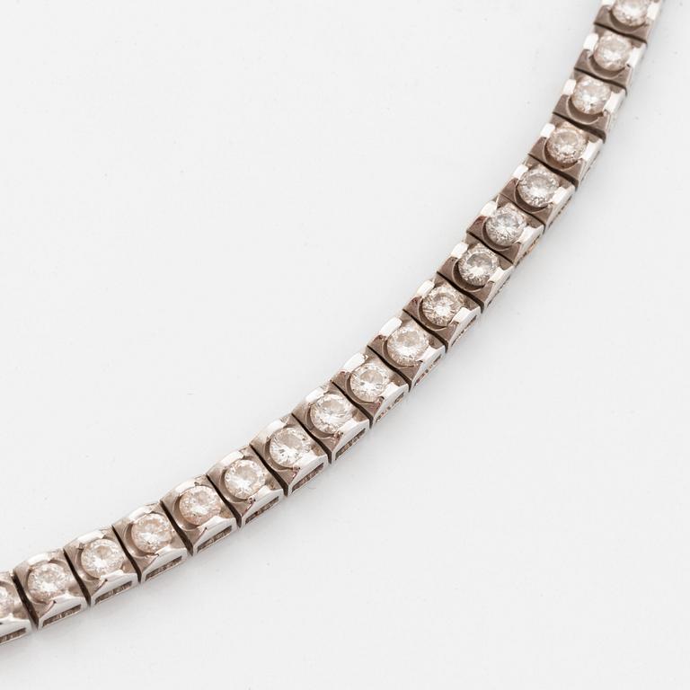 Collier rivière 18K vitguld runda briljantslipade diamanter.