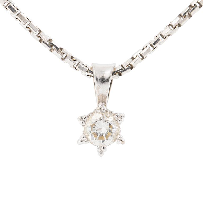 Pendant with chain in the shape of a star with a brilliant-cut diamond.