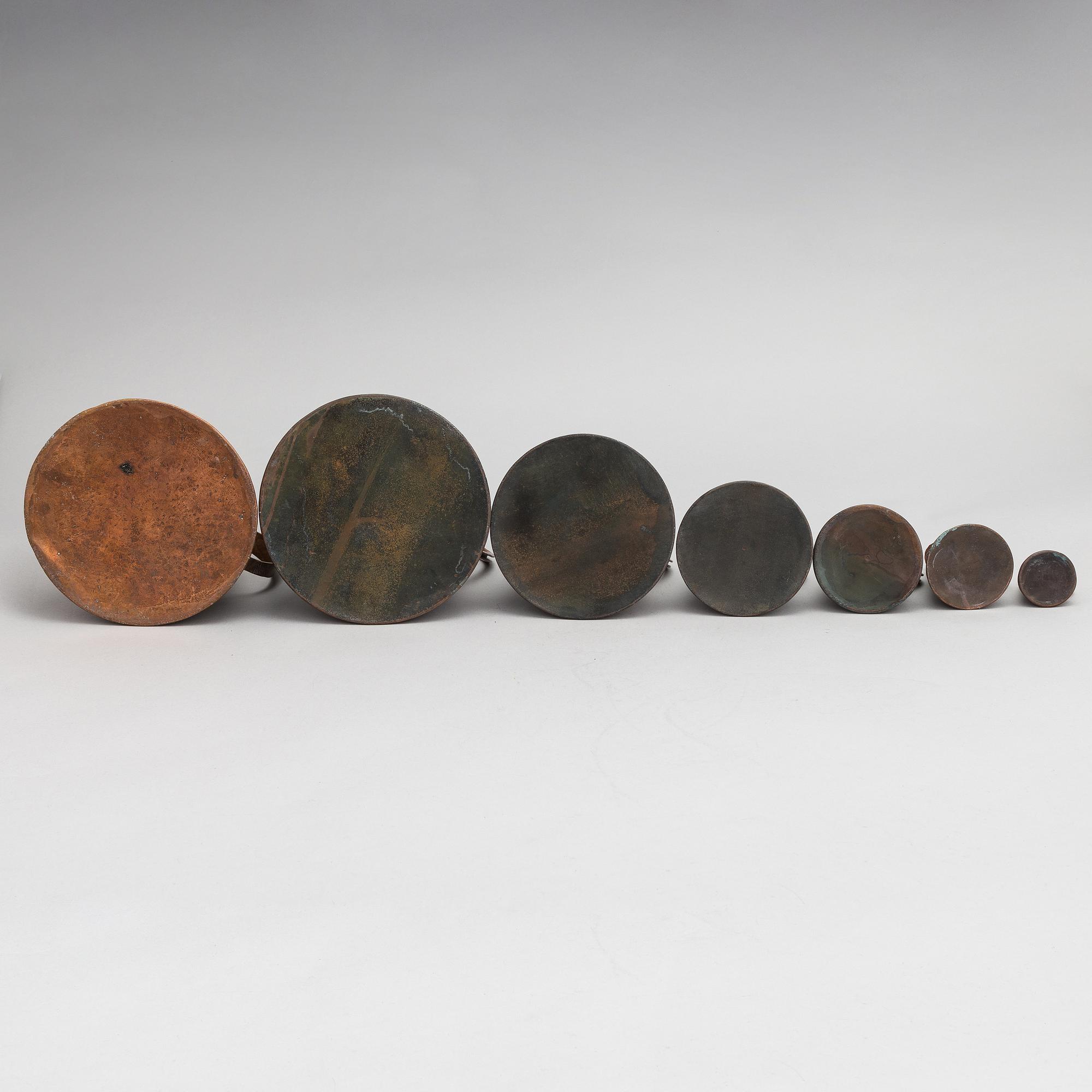 7 Swedish measuring cups from 20th century.