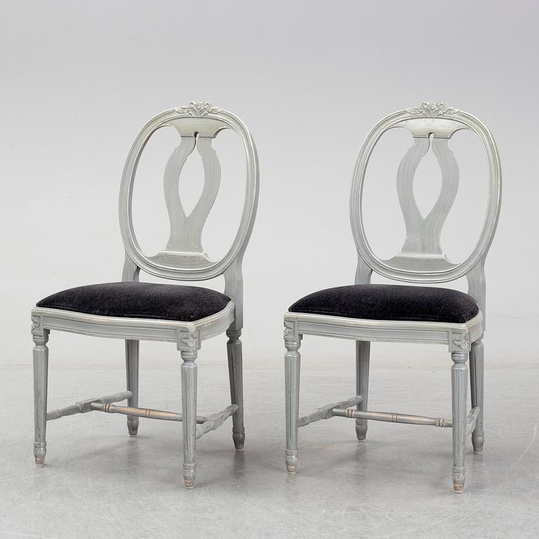 Eight second half of the 20th century Gustavian style chairs.
