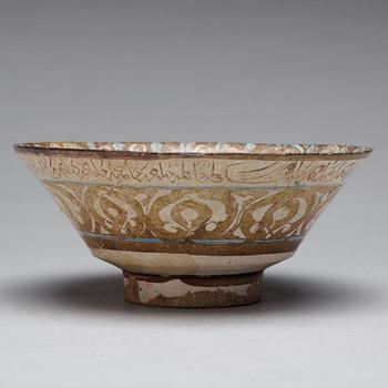 A BOWL, pottery with luster decor and blue, height ca 10 cm, diameter ca 23,5 cm, Kashan style, Persia/Iran 13th.