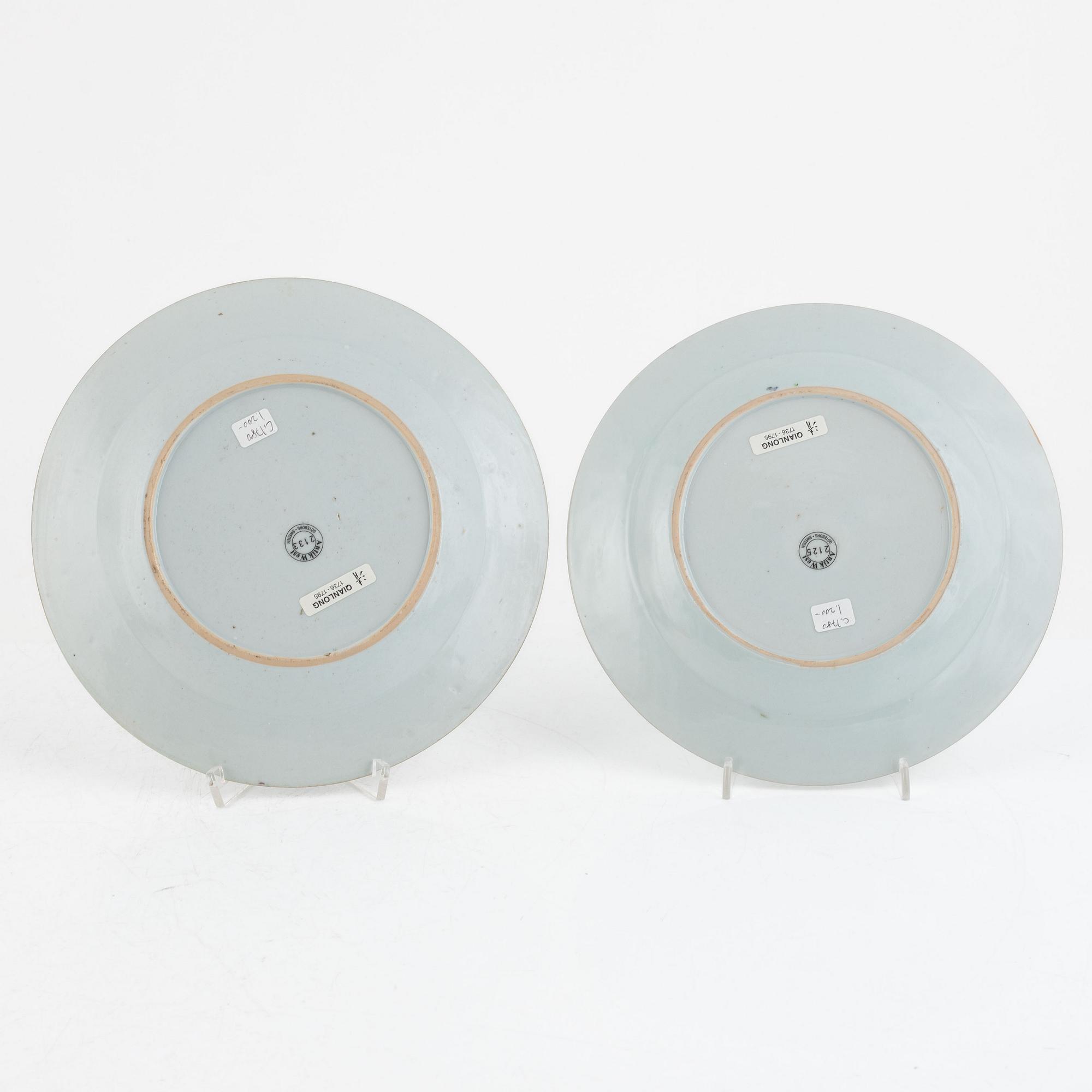 A set of five Chinese porcelain famille rose plates and one 'double peacock' plate, Qing dynasty, Qianlong (1736-95).