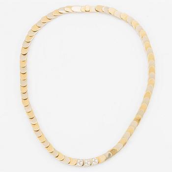 Gio Caroli, necklace, 18K gold with nine brilliant-cut diamonds.