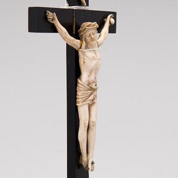 A WOODEN AND BONE TABLE CRUCIFIX with base. 19th Century.