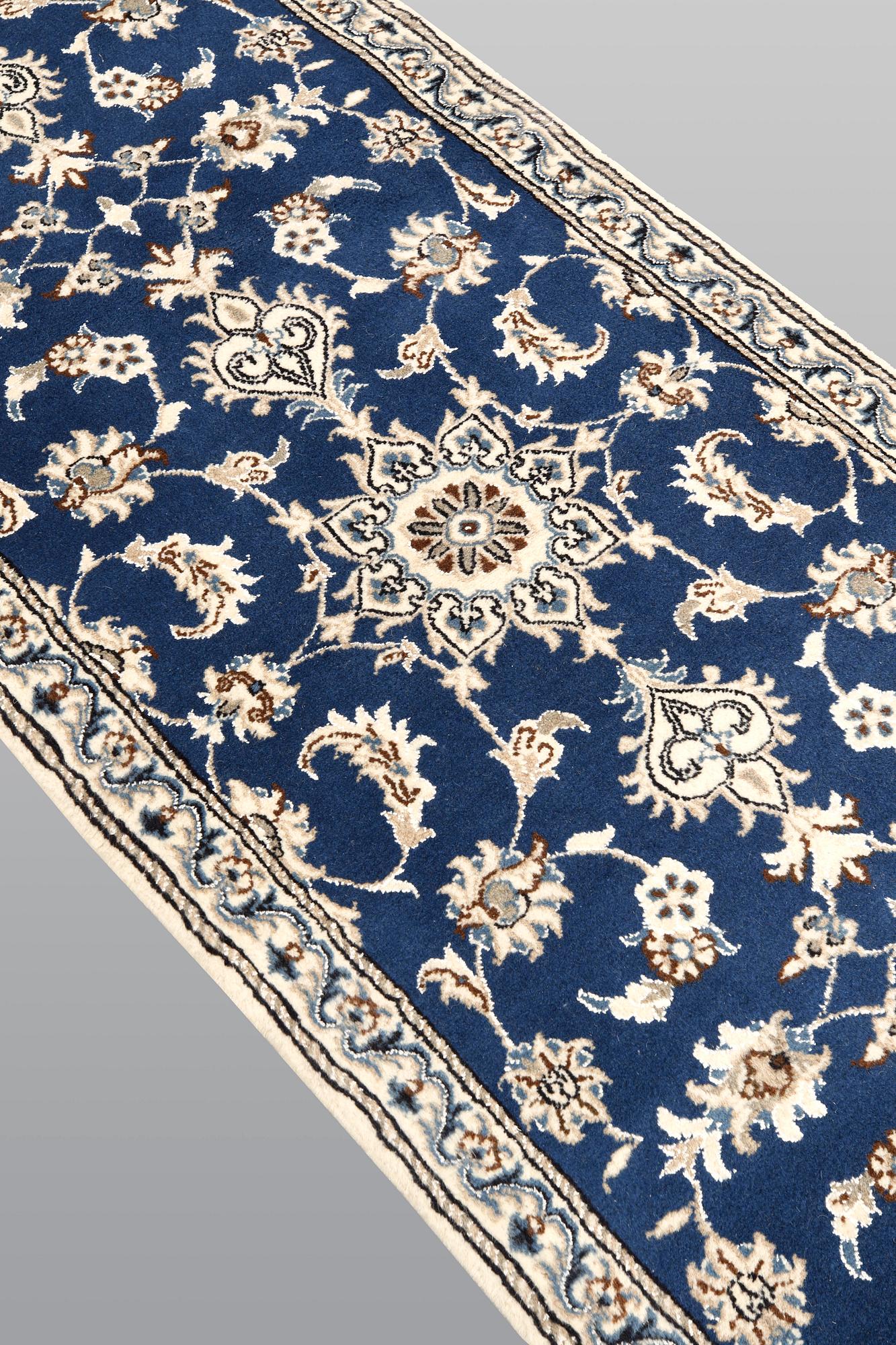 A Nain runner, ca 289 x 79 cm.