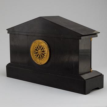 An end of the 19th century stone mantle clock.
